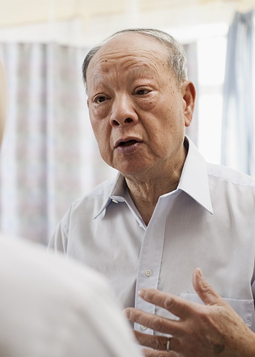 Patient explaining himself with hand gesture